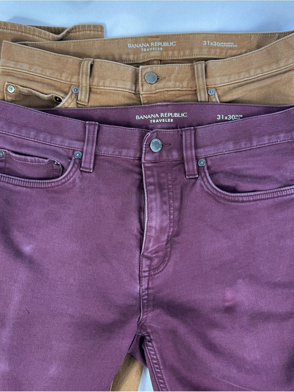 2 Pair Banana Republic Unisex Tan/ Eggplant Traveler Pants Size 31 X 30